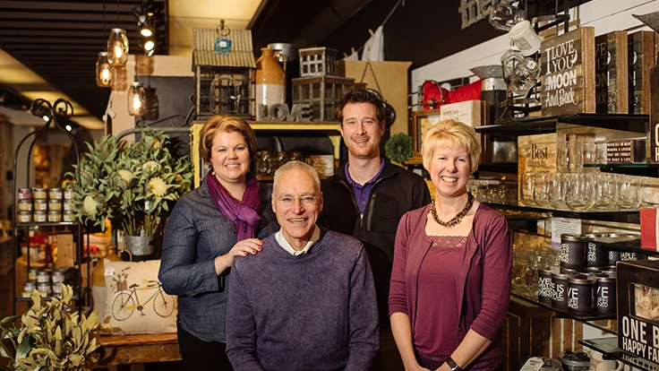 Family posing in a shop