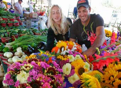 shoppers buying flowers