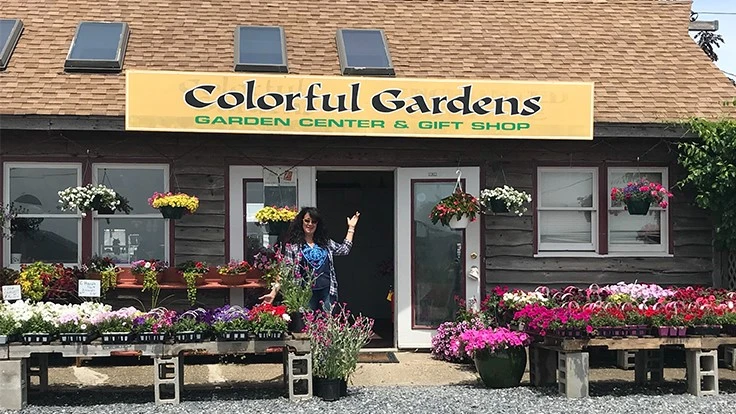 Owner Michele DeVito outside of Colorful Gardens in Jamesport, N.Y.