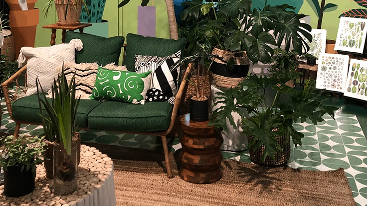 Greendigs Design Studio, a conception created by Scotts Miracle-Gro, features a wellness section in their space for customers to lounge in.