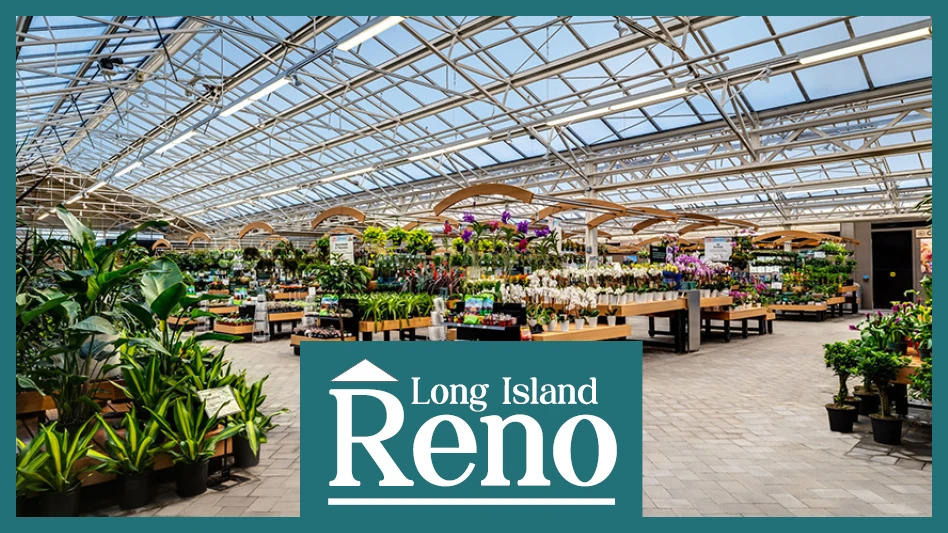 A greenhouse building with a clear glass ceiling and gray stone floors, with brown and black display stands full of green plants and flowers. A rectangular logo with white text and a teal background at the bottom of the image reads Long Island Reno.
