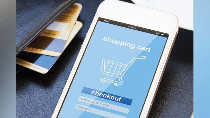 Phone with shopping cart on screen