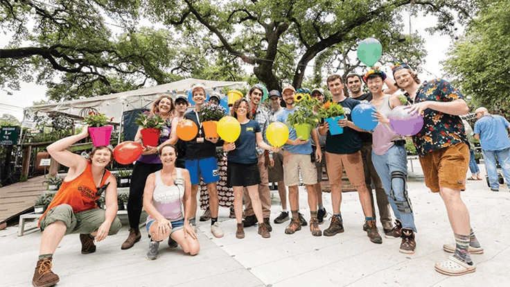 Group of people posing for photo